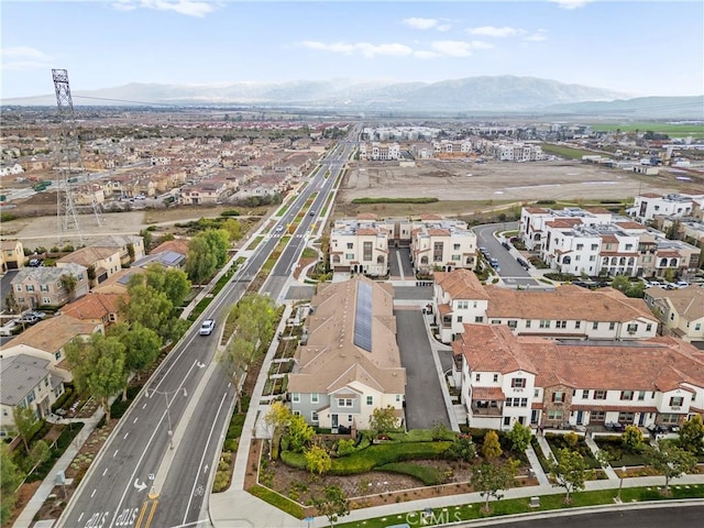 bird's eye view with a residential view and a mountain view