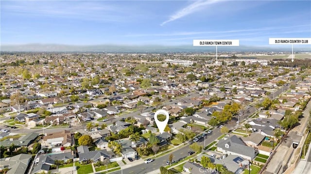 birds eye view of property with a residential view