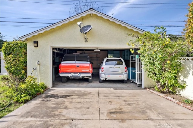 detached garage with fence