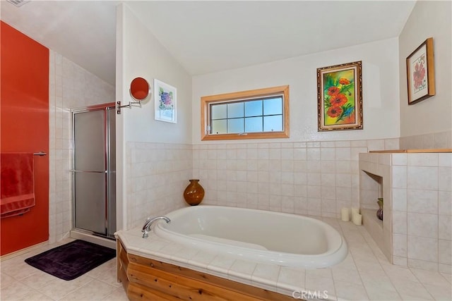 full bath featuring tile patterned flooring, visible vents, a shower stall, and a bath