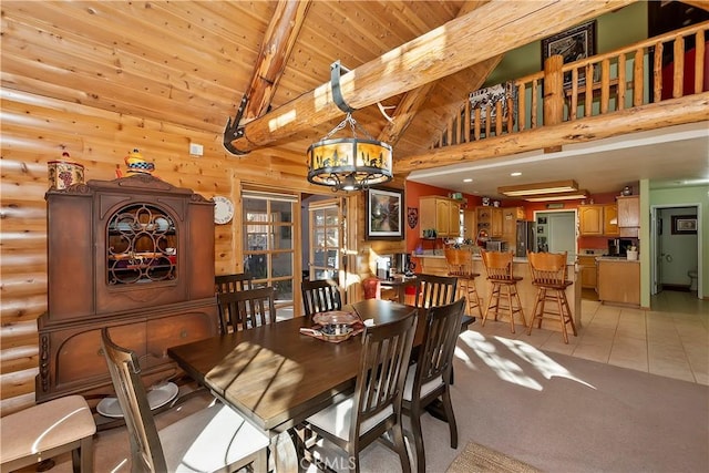 dining space with a notable chandelier, light tile patterned floors, rustic walls, wood ceiling, and high vaulted ceiling