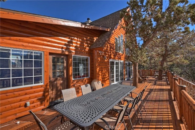 deck with outdoor dining space