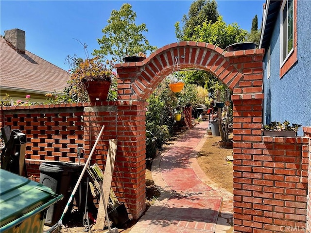 exterior space with brick siding