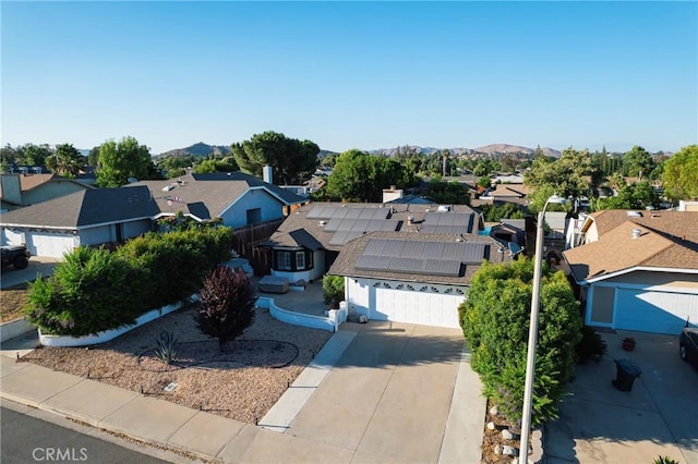 bird's eye view featuring a mountain view and a residential view