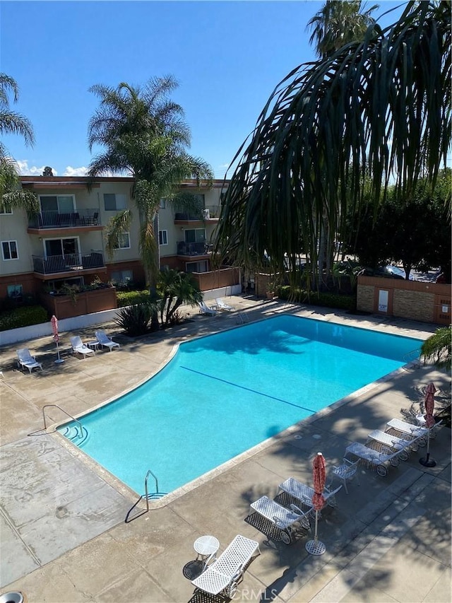 pool with a patio area