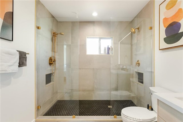 full bath with toilet and a stall shower