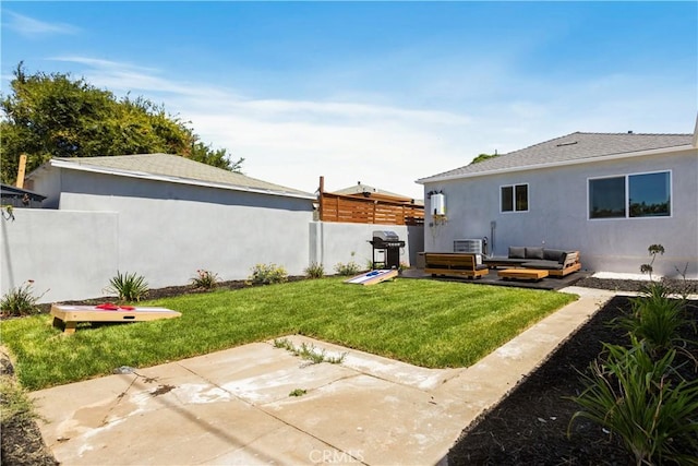 view of yard with a patio area, an outdoor hangout area, and fence