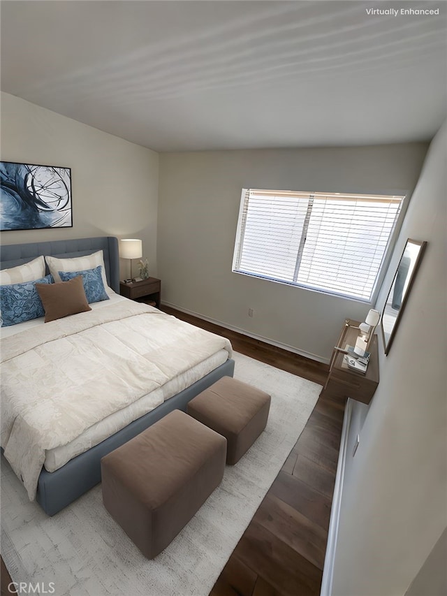 1001 W Macarthur Blvd Unit 50, Santa Ana, CA 92707 - bedroom with wood finished floors and baseboards
