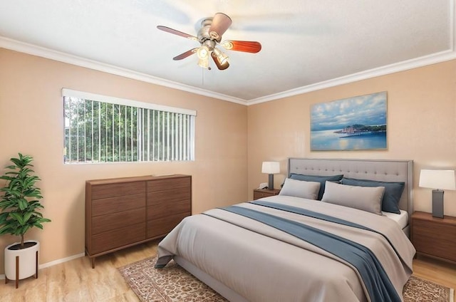 bedroom with light wood-type flooring, baseboards, ornamental molding, and a ceiling fan