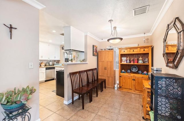 kitchen featuring crown molding, visible vents, white cabinets, and dishwasher