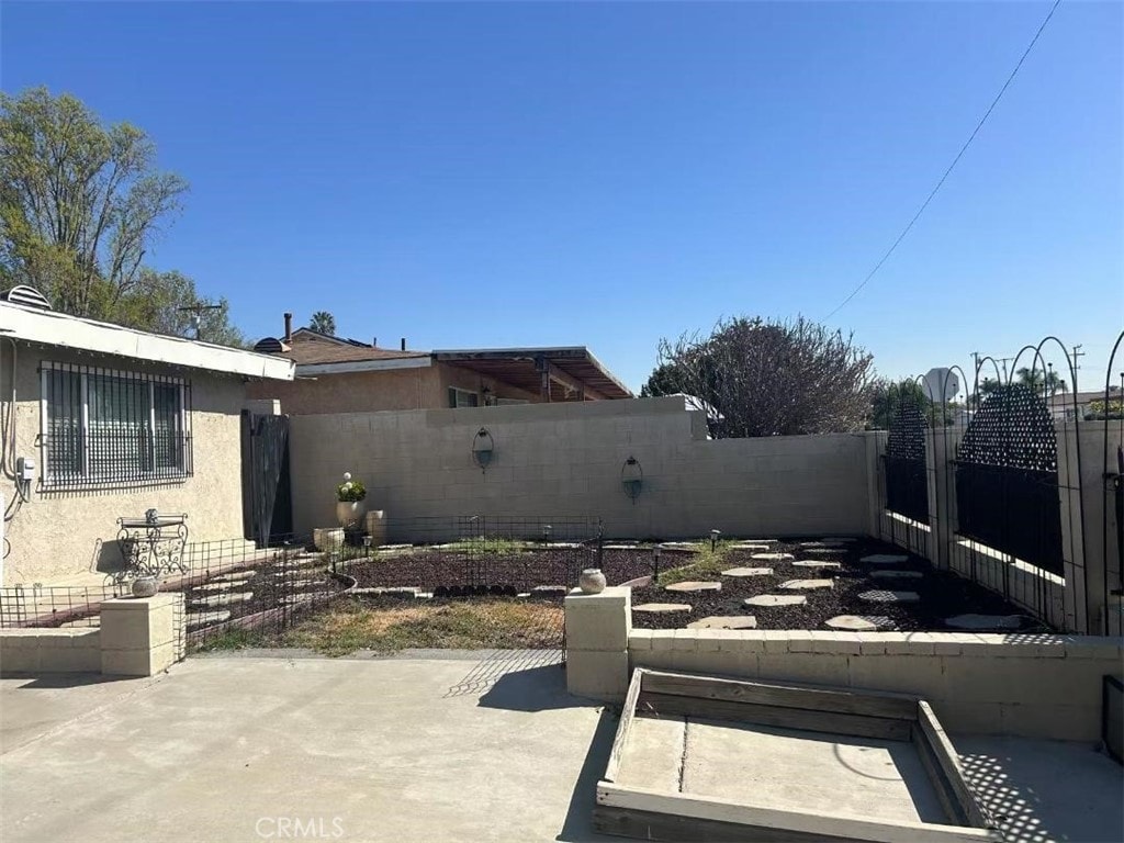 view of patio with a fenced backyard