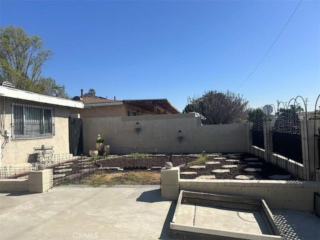 view of patio with a fenced backyard