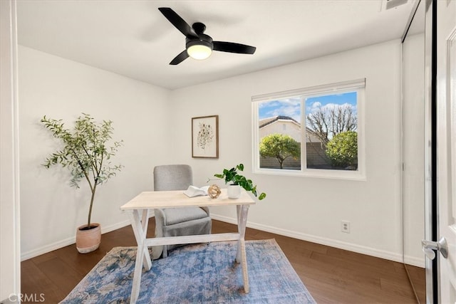 office area featuring ceiling fan, baseboards, and wood finished floors