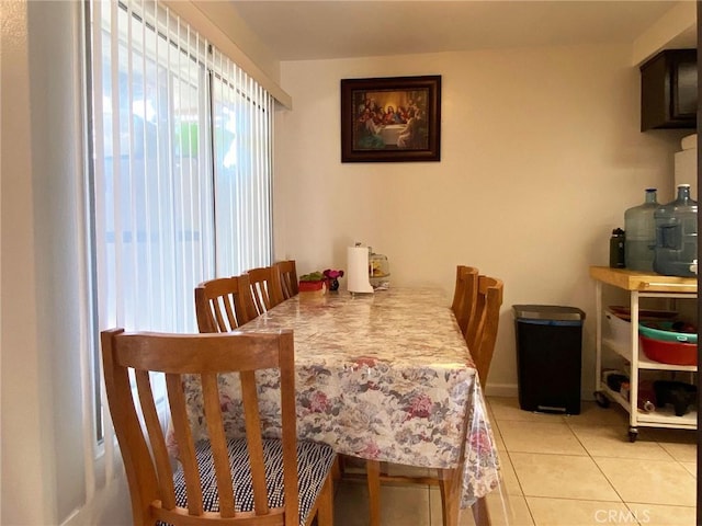 dining room featuring light tile patterned floors