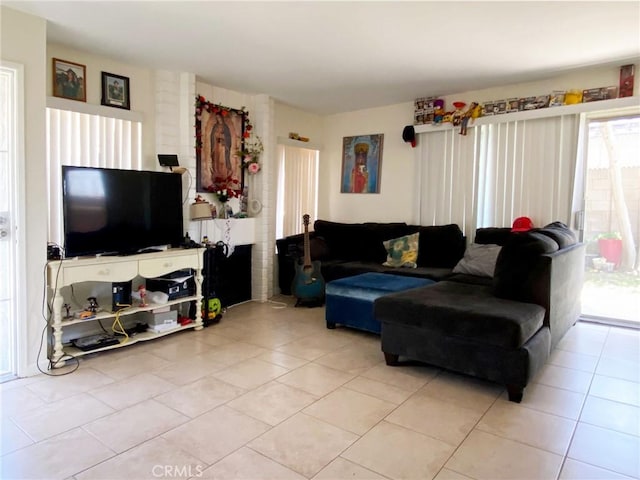 living area featuring light tile patterned floors