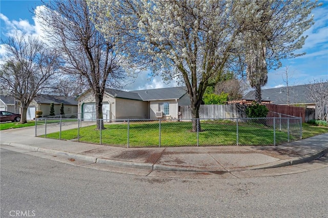 single story home with driveway, a fenced front yard, an attached garage, a front yard, and stucco siding