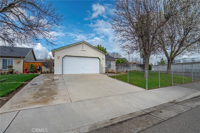 ranch-style home featuring a garage, a front lawn, fence, and stucco siding