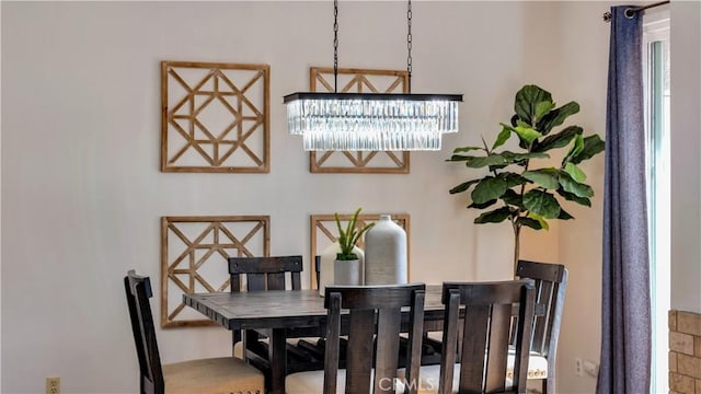 dining area with a chandelier