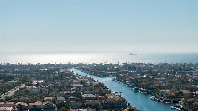 aerial view with a water view and a residential view