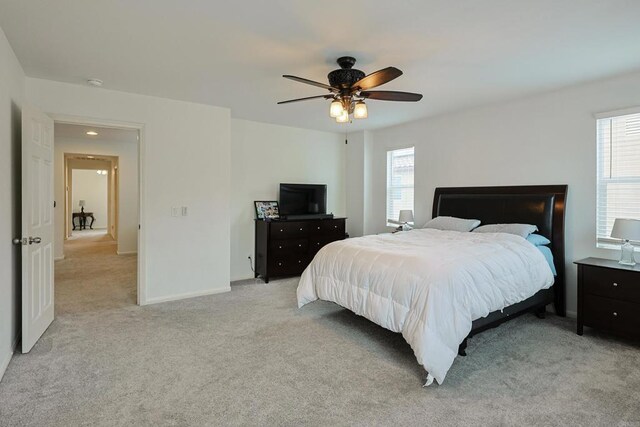 1582 Moonbeam Ln, Chula Vista, CA 91915 - bedroom with light carpet, baseboards, and ceiling fan