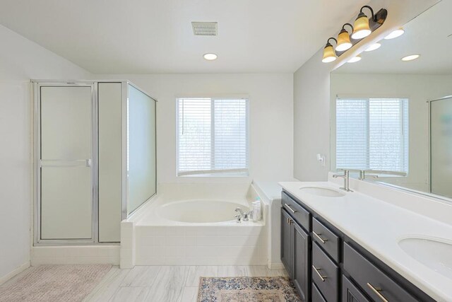 1582 Moonbeam Ln, Chula Vista, CA 91915 - bathroom featuring a garden tub, a shower stall, double vanity, and recessed lighting