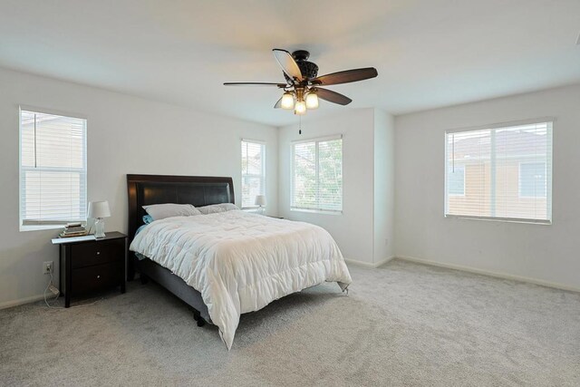1582 Moonbeam Ln, Chula Vista, CA 91915 - bedroom with light colored carpet, baseboards, and a ceiling fan
