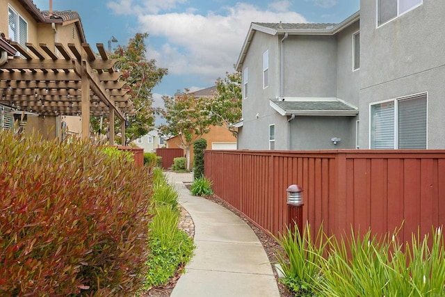 1582 Moonbeam Ln, Chula Vista, CA 91915 - view of property exterior with stucco siding and a pergola