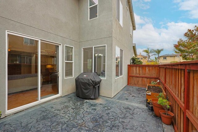 1582 Moonbeam Ln, Chula Vista, CA 91915 - fenced backyard with a patio and grilling area