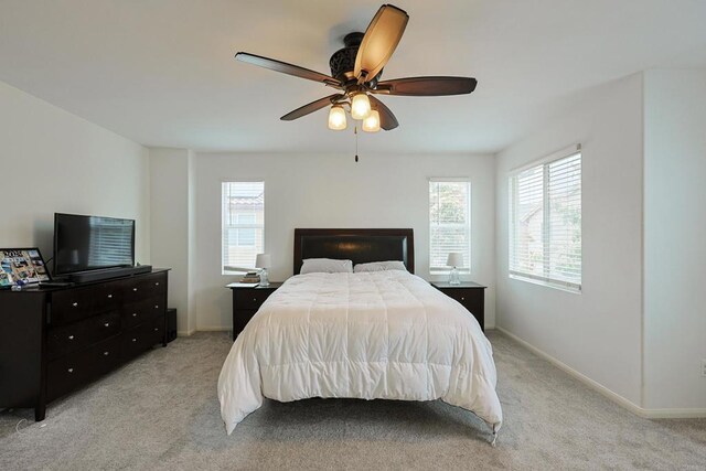 1582 Moonbeam Ln, Chula Vista, CA 91915 - bedroom with multiple windows, light carpet, and baseboards