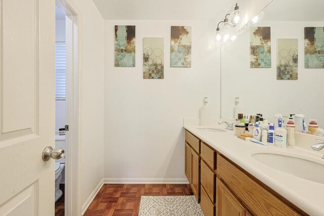 1582 Moonbeam Ln, Chula Vista, CA 91915 - full bath featuring double vanity, toilet, and baseboards