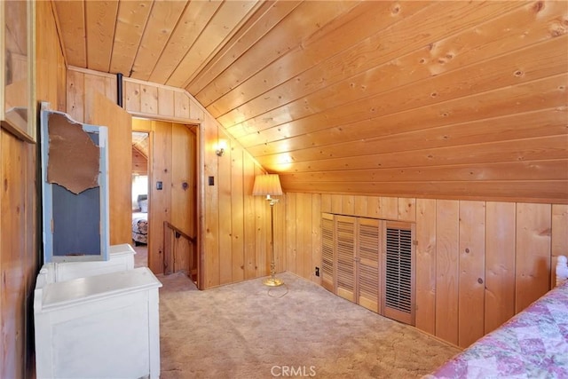 bonus room with lofted ceiling, wood ceiling, carpet flooring, and wood walls