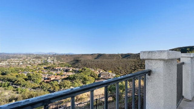 balcony featuring a mountain view