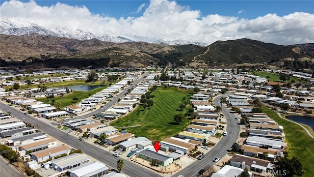 aerial view with a residential view and a water and mountain view