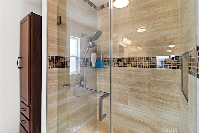 bathroom featuring a stall shower