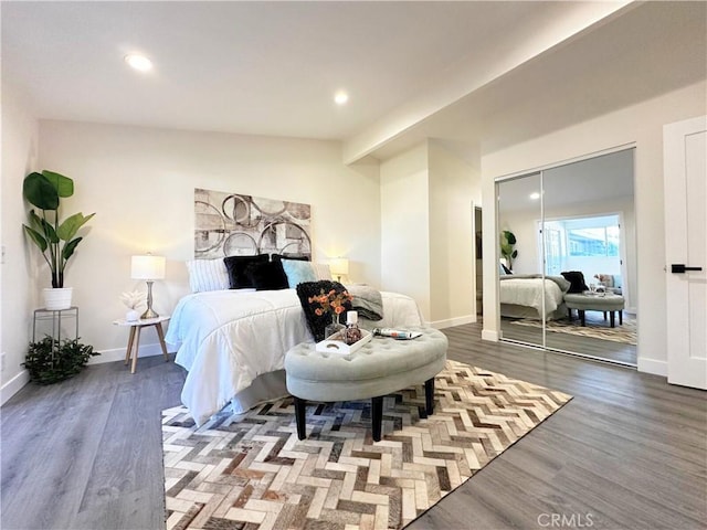 bedroom featuring recessed lighting, baseboards, and wood finished floors