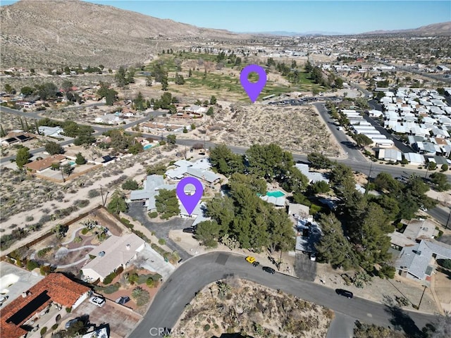 bird's eye view featuring a residential view and a mountain view