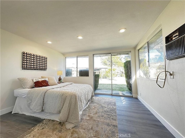 bedroom featuring access to outside, baseboards, dark wood finished floors, and recessed lighting