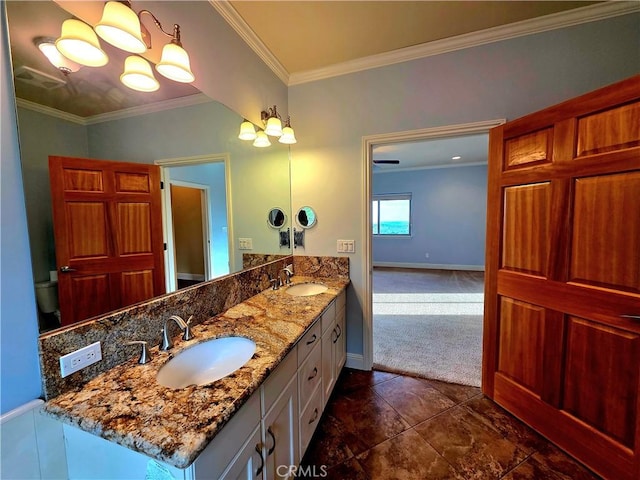 full bath featuring crown molding, visible vents, and a sink