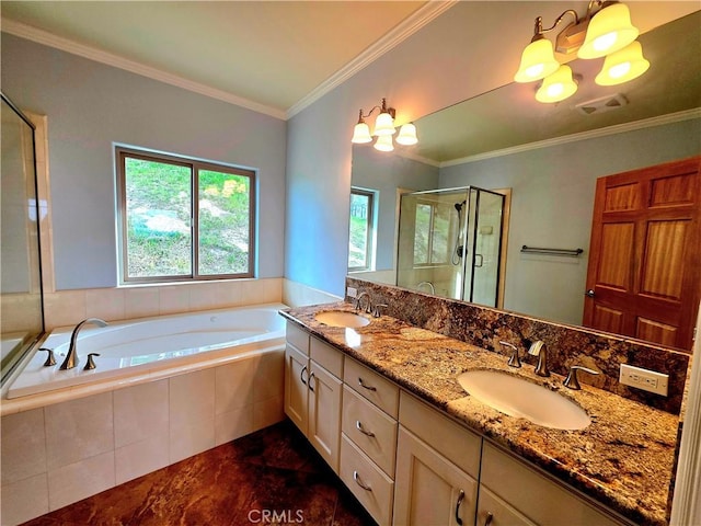 bathroom with ornamental molding, visible vents, a sink, and a shower stall