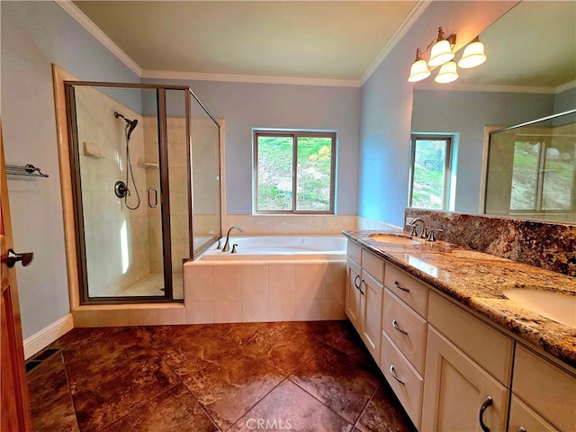 bathroom with ornamental molding, a sink, and a shower stall