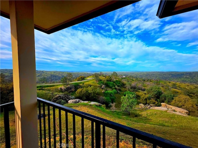 balcony with a view of trees