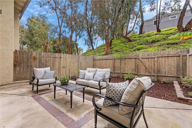 view of patio / terrace with outdoor lounge area and a fenced backyard