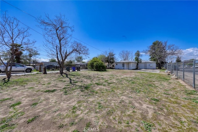 view of yard with fence