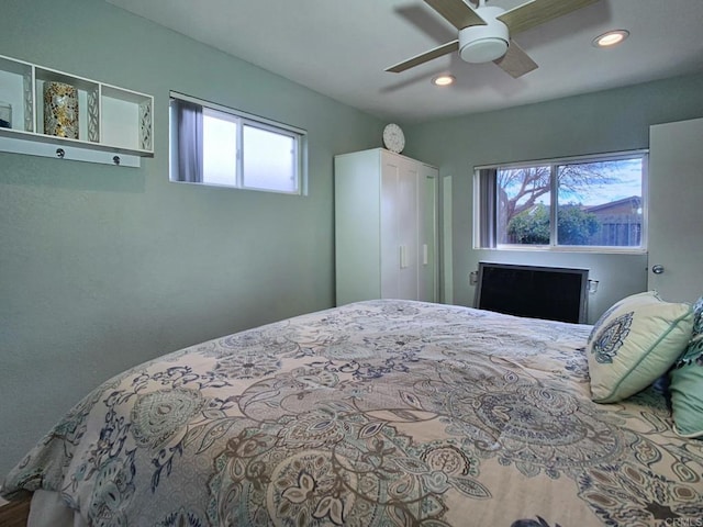 bedroom featuring ceiling fan and recessed lighting