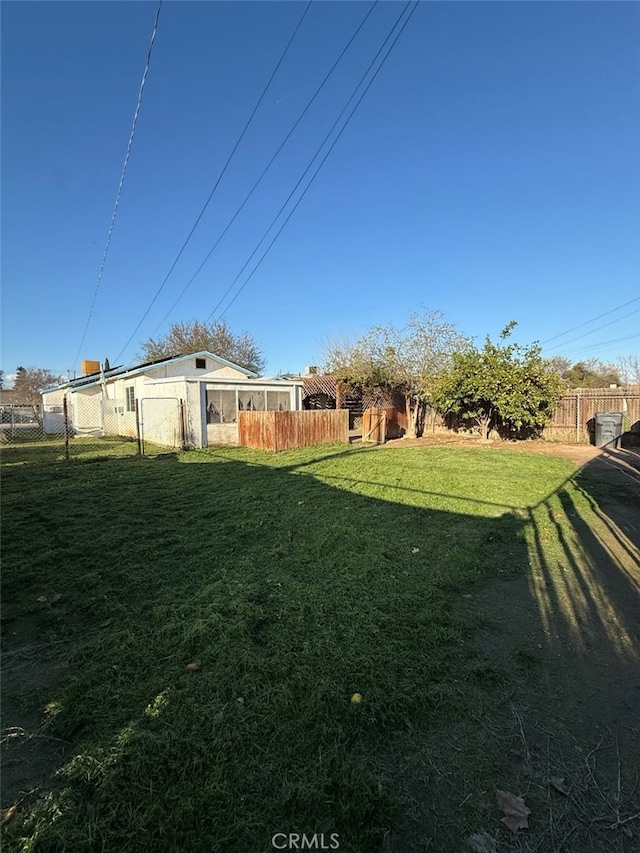 view of yard with fence