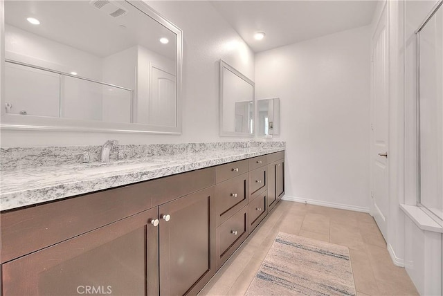 full bathroom with tile patterned floors, visible vents, a sink, recessed lighting, and double vanity