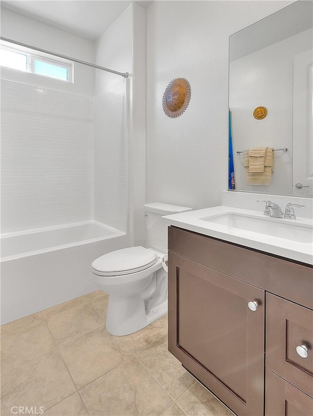 bathroom with vanity, tile patterned floors, toilet, and shower / tub combination