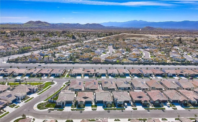 birds eye view of property with a residential view and a mountain view