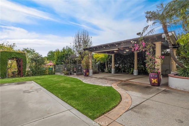 view of yard featuring a patio area and fence