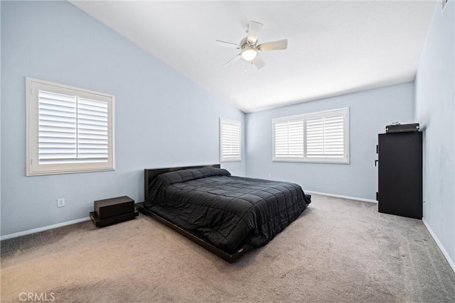 bedroom featuring lofted ceiling, carpet floors, a ceiling fan, and baseboards